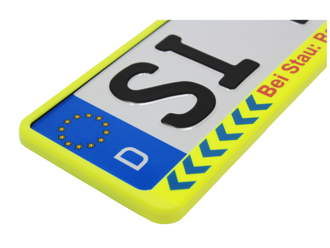 Kennzeichenhalter Neongelb "Bei Stau: Rettungsgasse bilden" 520x110 mm